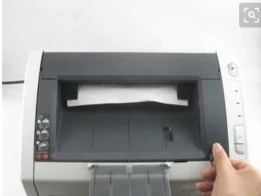 打印机纸吸不进去检查纸张方向和类型并清洁滚轮重试